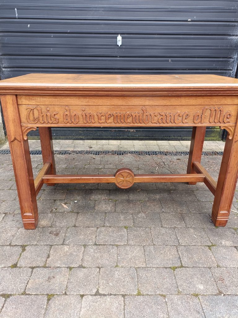 C1890 Church Communion Table. Believe Oak. Solid. Heavy. Measurements are 4 ft long x 2 ft deep x 32 ins. 24 ins under the table